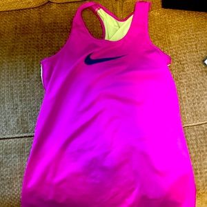 Bundle of Under Armour and Nike tanks. Girls Medium